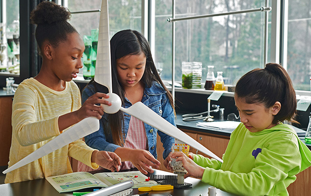 Girls building windmill