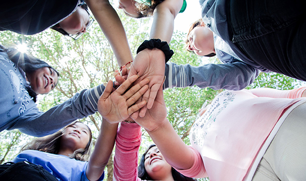 girl scouts hands together